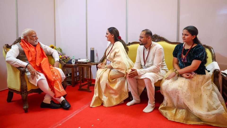 Ambrish Kellkar and family with the Hon'ble Prime Minister of India at the Art of Living International Centre, Bengaluru